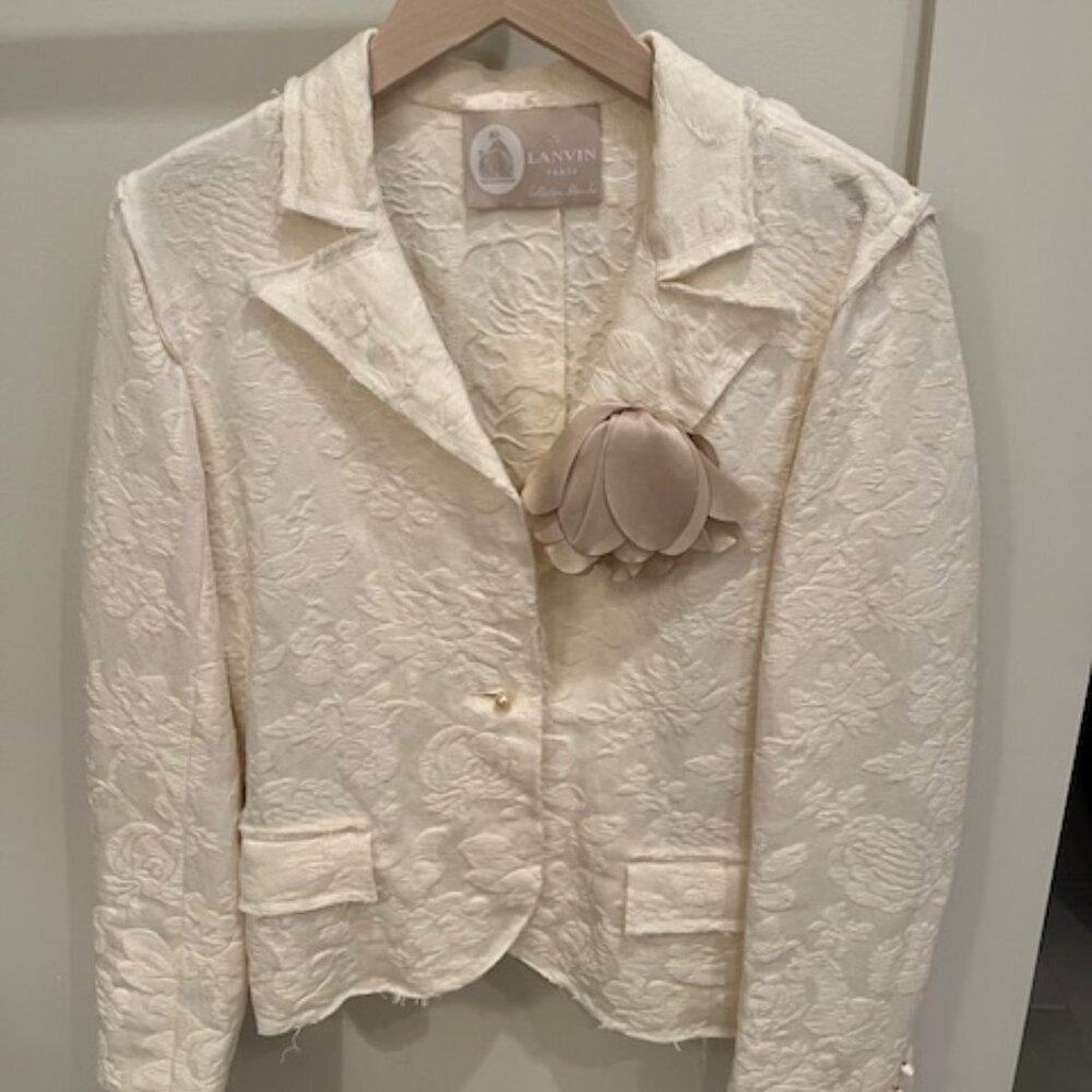 Lanvin white jacket with flower brooch